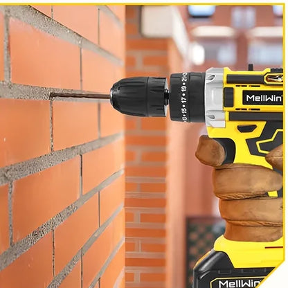 Perceuse-visseuse sans fil perçant un mur en briques